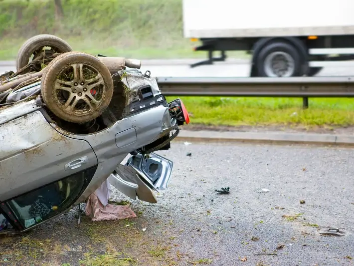 Mesa DUI victim injury lawyer reviewing crash evidence from a wide arterial road near Downtown Mesa Historic District